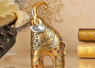 Statue animale de figurine d'éléphant de couleur d'or de métiers de décorations de maison de résine